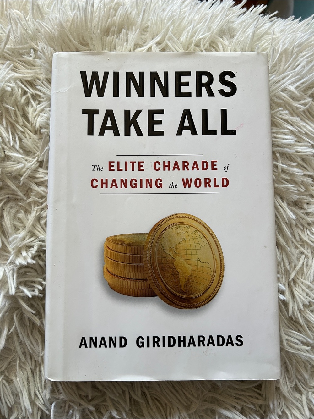 Winners Take All by Anand Giridharadas — White Cover with Gold Coin hardcover